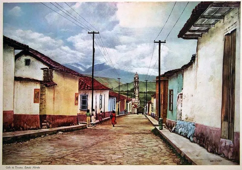 Reproducción del cuadro «Calle de Timotes, Estado Mérida», firmado por Bob Wygant: la calle empedrada con la torre de la Basílica al fondo.